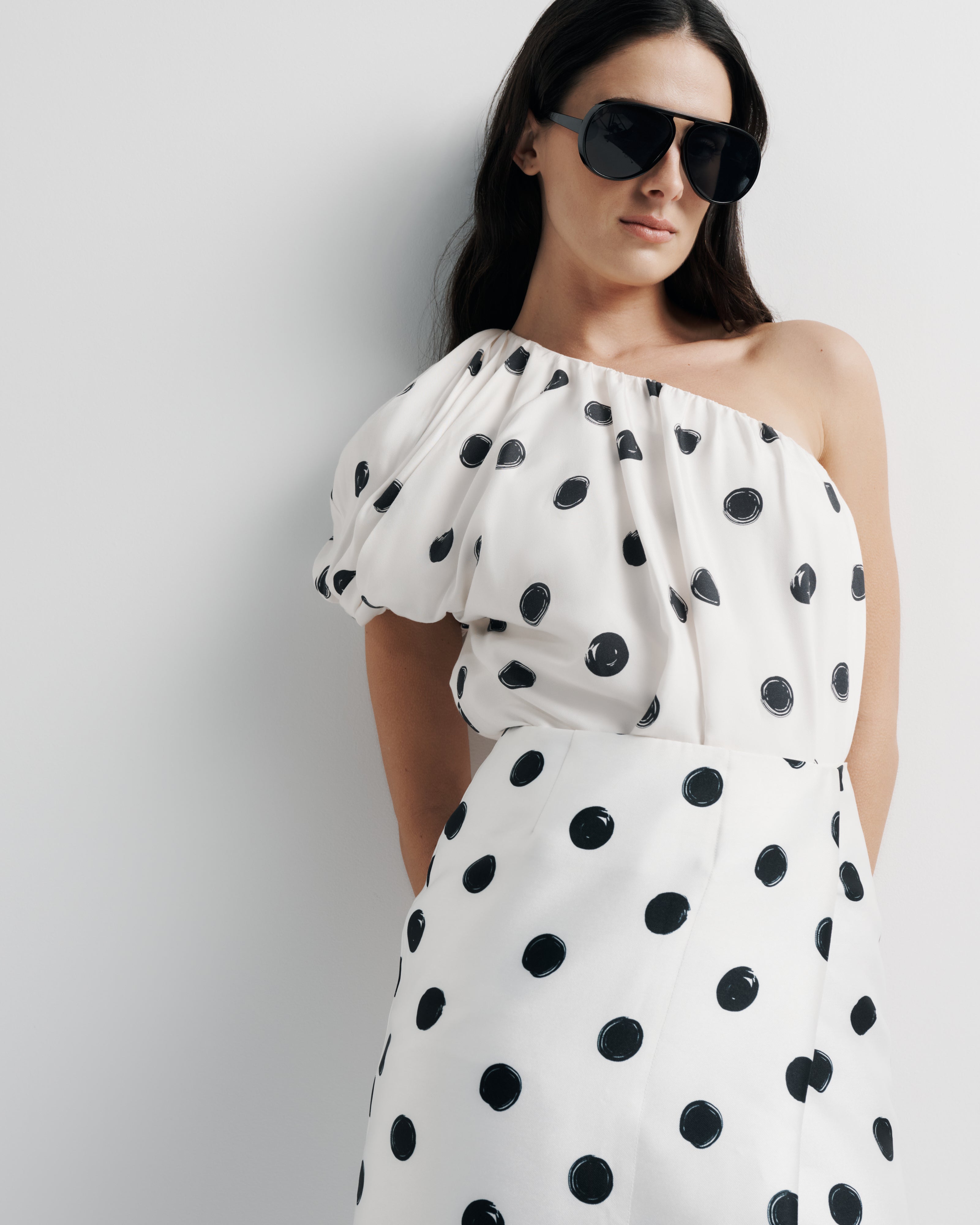 Yasmin Top – one-shoulder top with sculpted folds and artistic spot print by Romy The Brand