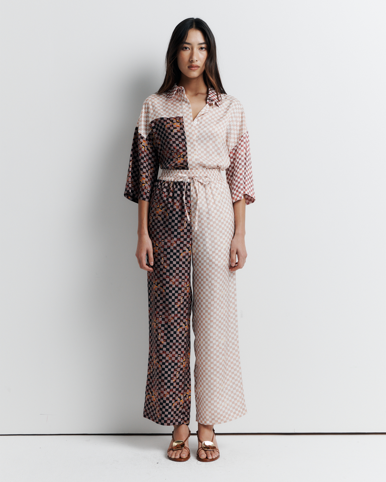 Discover the June Pant – Comfortable elastic waist pants with side pockets and drawcord, featuring exclusive artwork by Phoebe Willis.