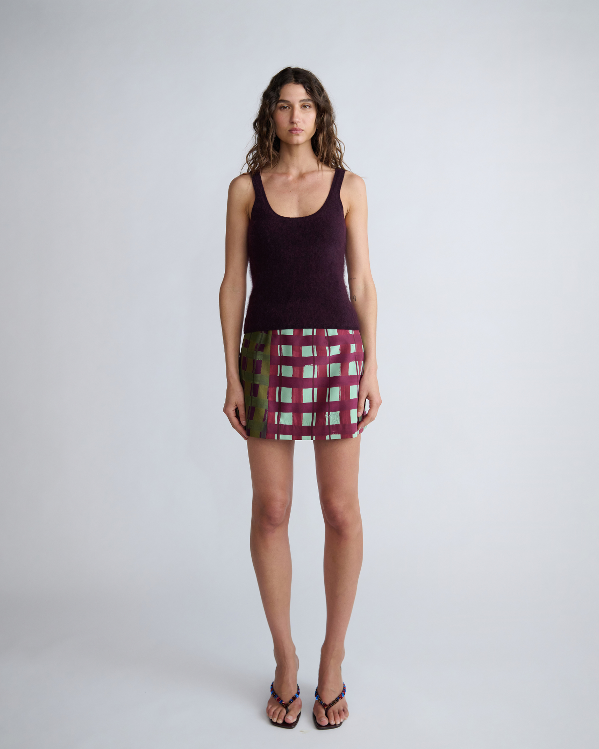 Front view of the ROMY Lucy Knit Tank showing its close-fitting silhouette and sleeveless wool knit design.