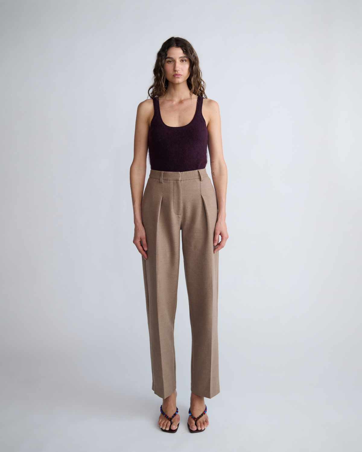 Sloane Pant in fawn, side view on model.