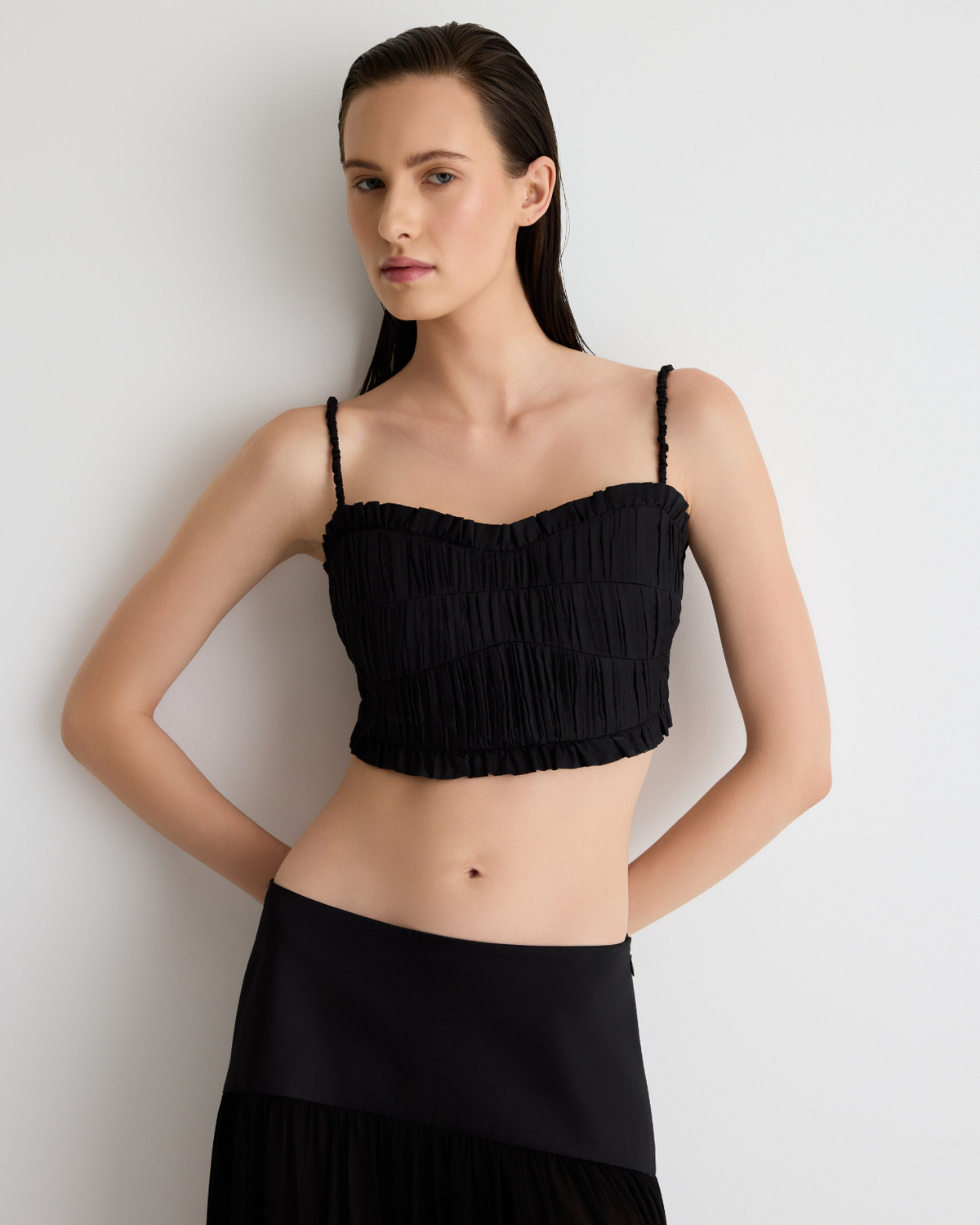 Daisy Bustier – pleated cotton cropped bustier with frill edging, shirred back, and detachable straps by Romy The Brand