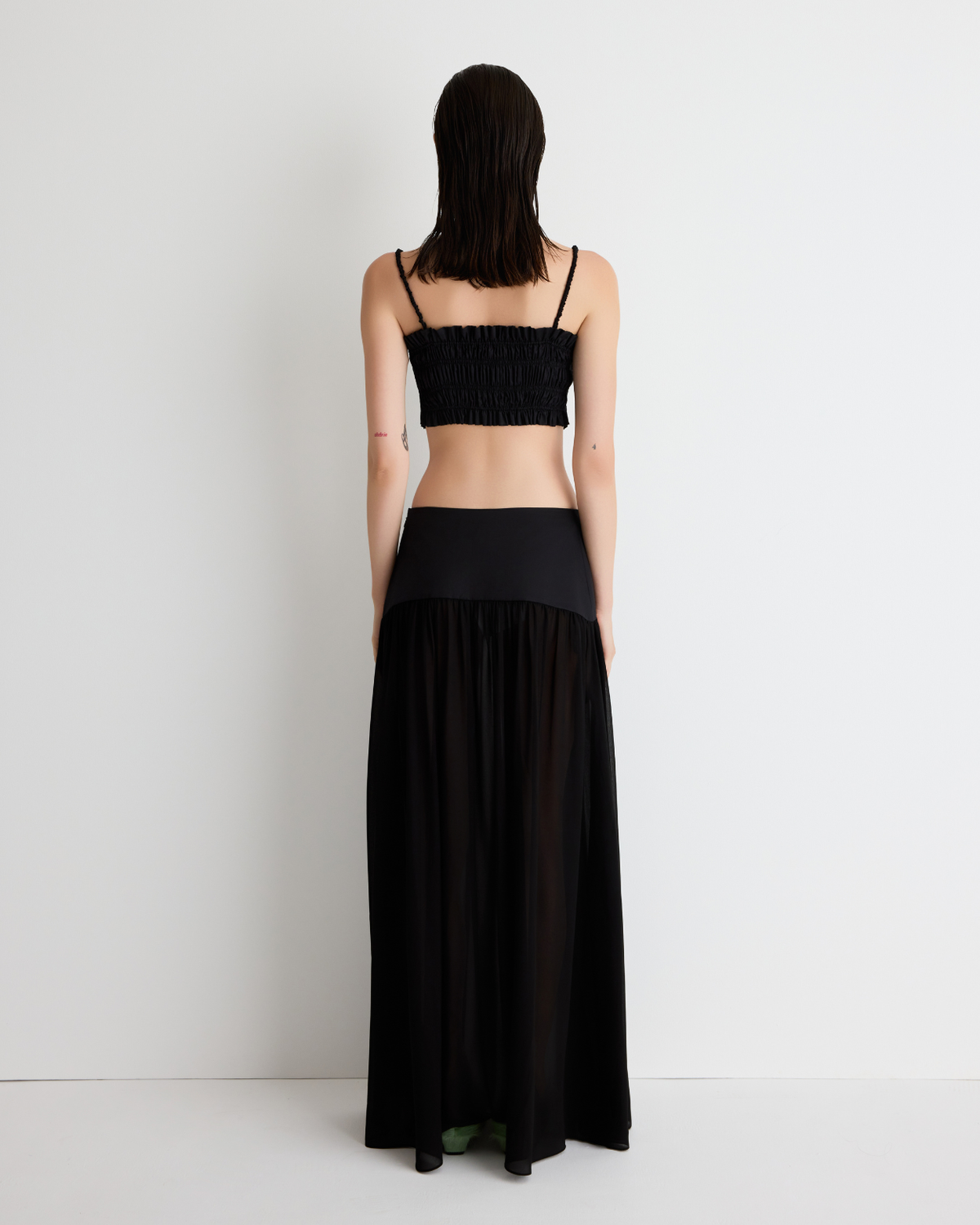 Harper Skirt in sheer black with the Daisy Bustier, back view on model.
