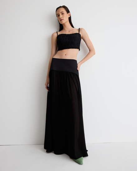 Harper Skirt in sheer black with the Daisy Bustier, front view on model.