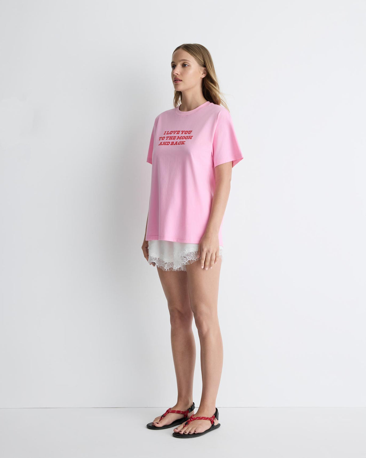 Love You To The Moon + Back Tee in pink, three-quarter view on model.