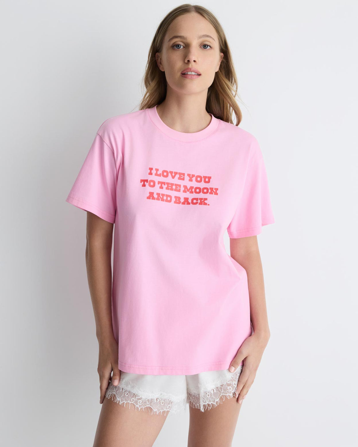 Love You To The Moon + Back Tee in pink, front view on model, waist up.