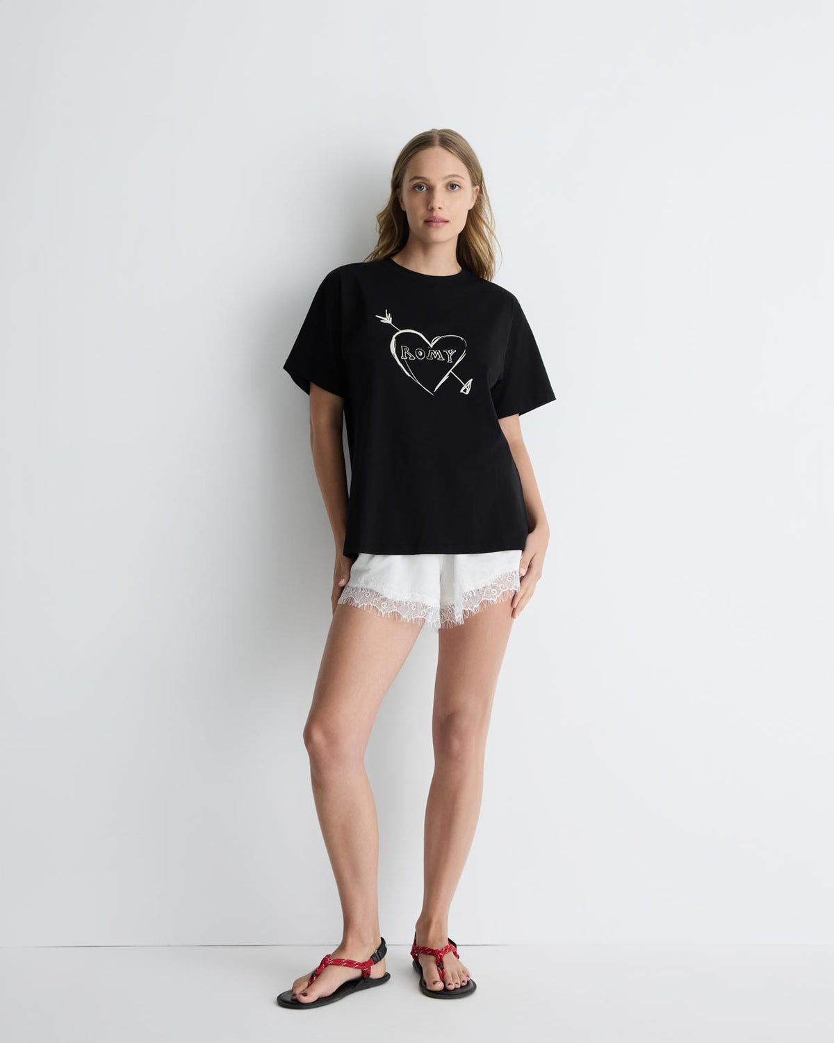 Cupid's Heart Tee in black, front view on model.