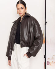 DESCRIPTION: Add volume to your winter wardrobe with our Padded Bomber Jacket, made from a buttery soft faux leather in the most gorgeous Chocolate Brown colour way. DETAILS: Vegan Leather/ 100% PoyurethaneMade in China CARE:Dry Clean Only. SIZE AND FIT: Model is size 8 and wearing a size S. By Romy. 