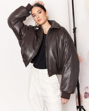DESCRIPTION: Add volume to your winter wardrobe with our Padded Bomber Jacket, made from a buttery soft faux leather in the most gorgeous Chocolate Brown colour way. DETAILS: Vegan Leather/ 100% PoyurethaneMade in China CARE:Dry Clean Only. SIZE AND FIT: Model is size 8 and wearing a size S. By Romy. 