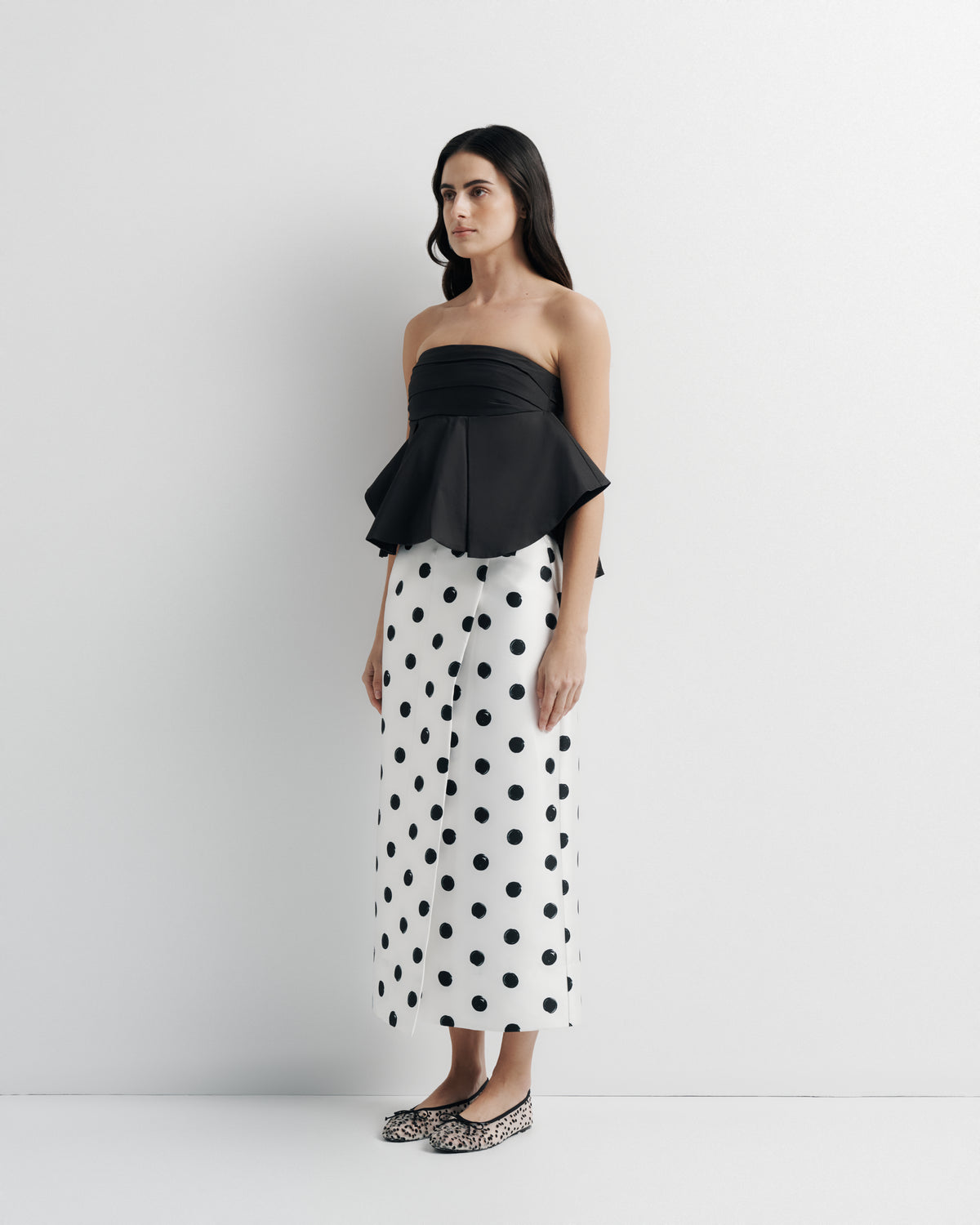 Bella Bustier in black, three-quarter view on model.