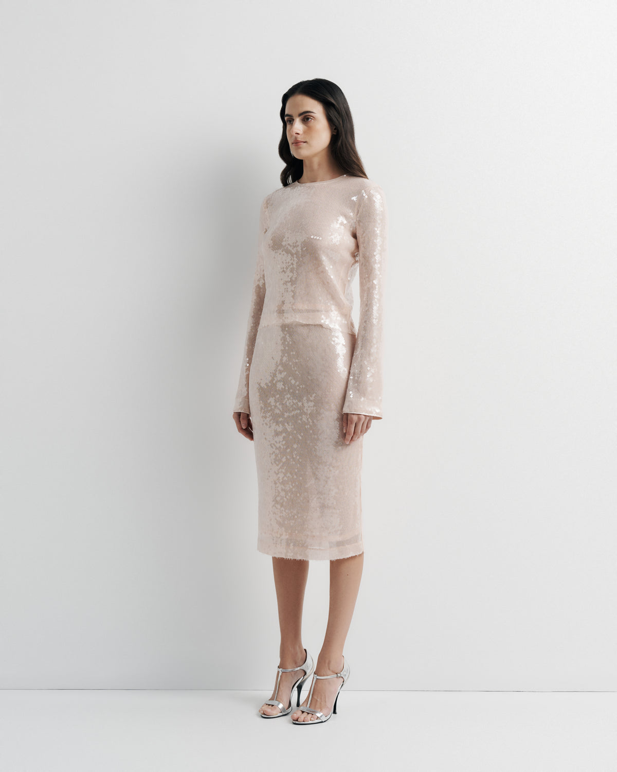 Sara Top in pink sequin with polyester mesh lining, front view on model, alternate pose.