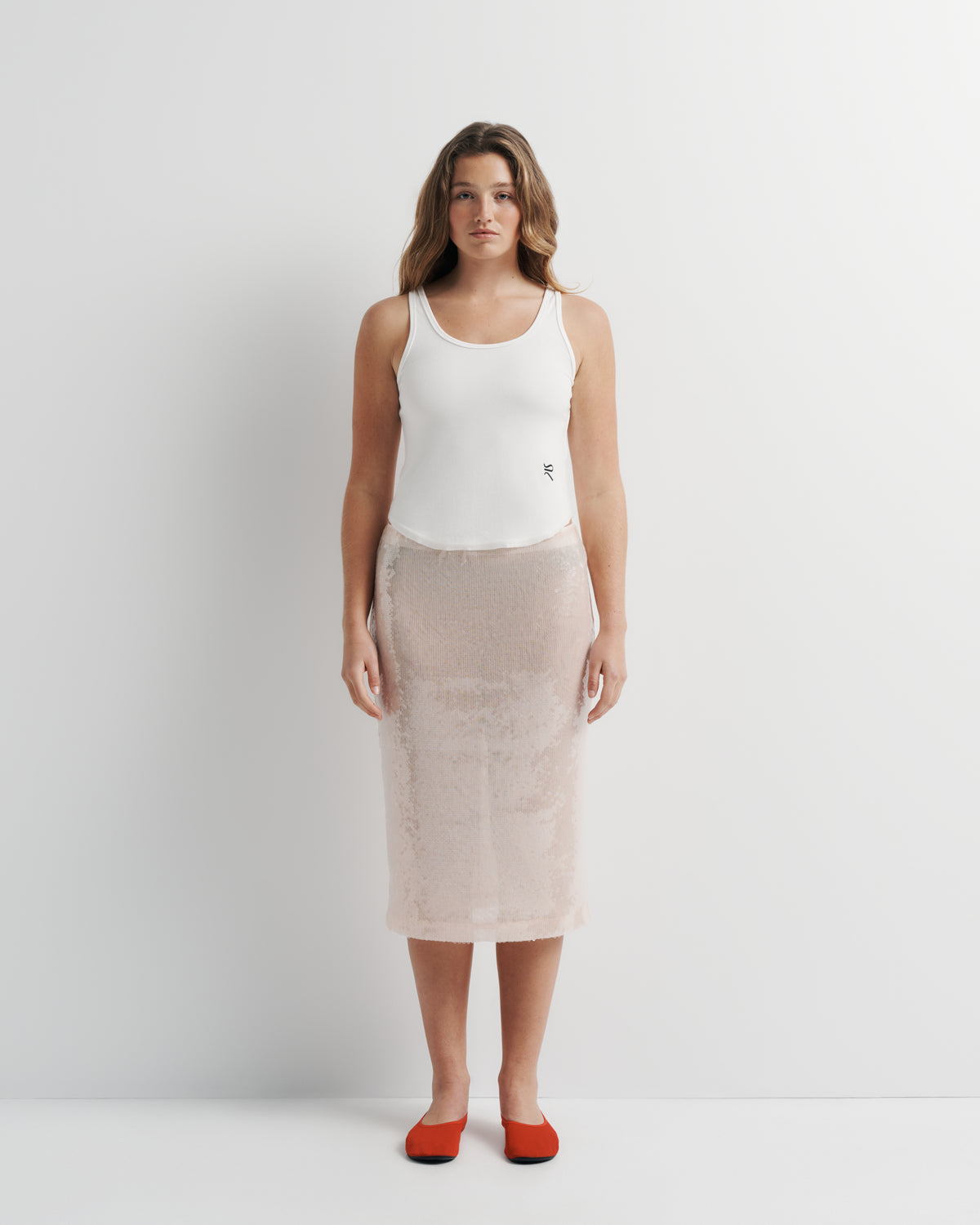 Janey Midi Skirt in pink sequin with polyester mesh lining, front view on model, second look.