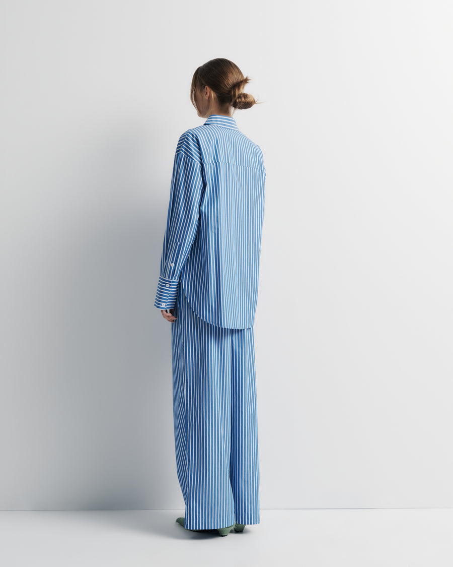 Tara Shirt – oversized 100% cotton shirt with high–low hem, oversized cuffs, and Romy embroidery by Romy The Brand