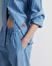 Tara Shirt – oversized 100% cotton shirt with high–low hem, oversized cuffs, and Romy embroidery by Romy The Brand