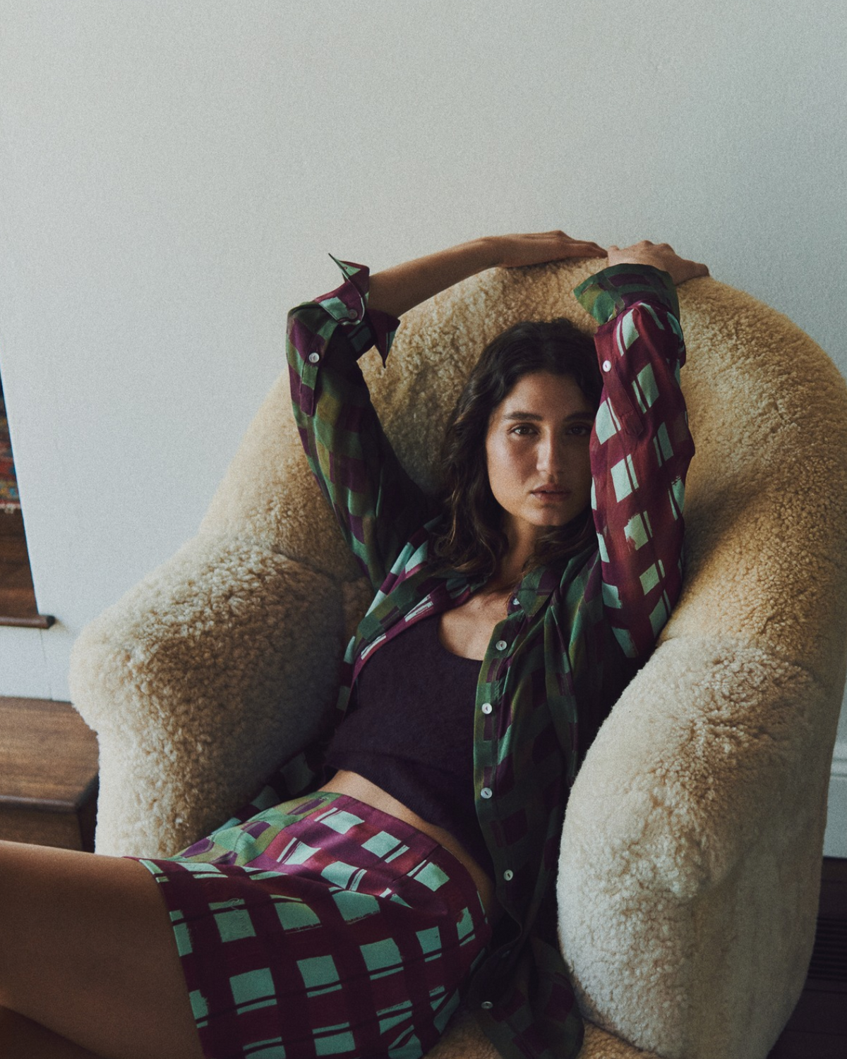 ROMY Ardent Skirt in burgundy, olive and mint check print, styled with a matching shirt and plum knit tank.