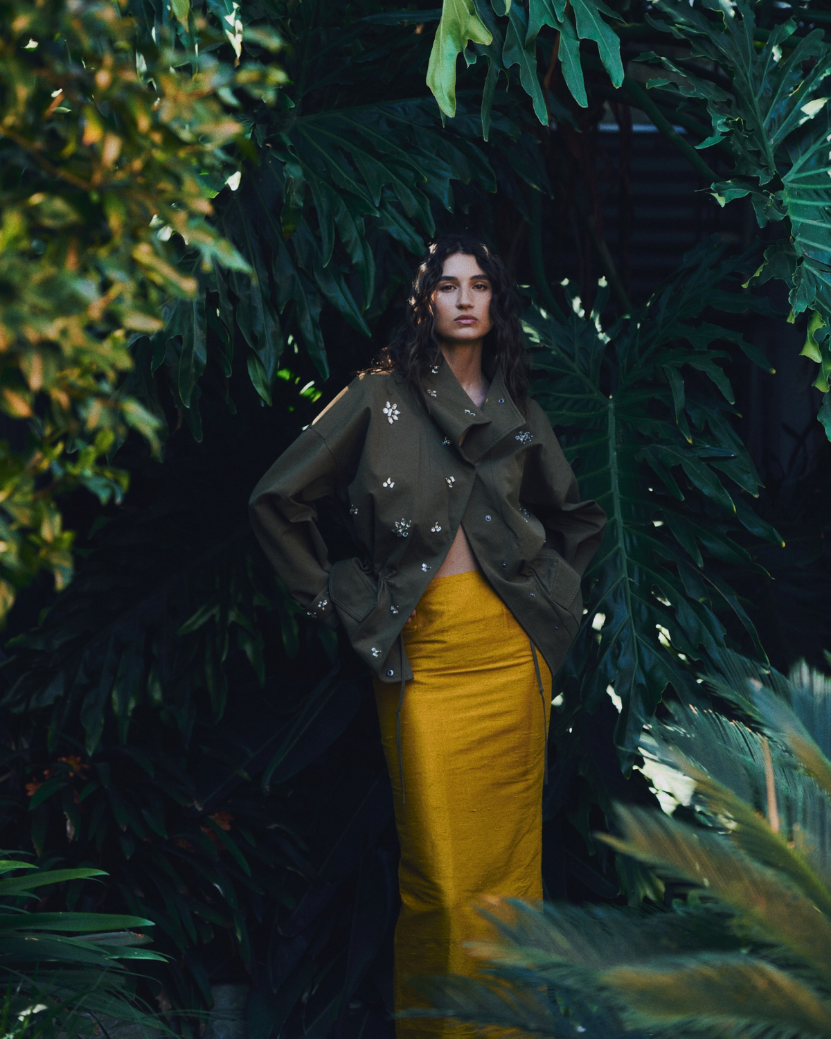 Veda Skirt in gold raw silk, styled campaign shot.