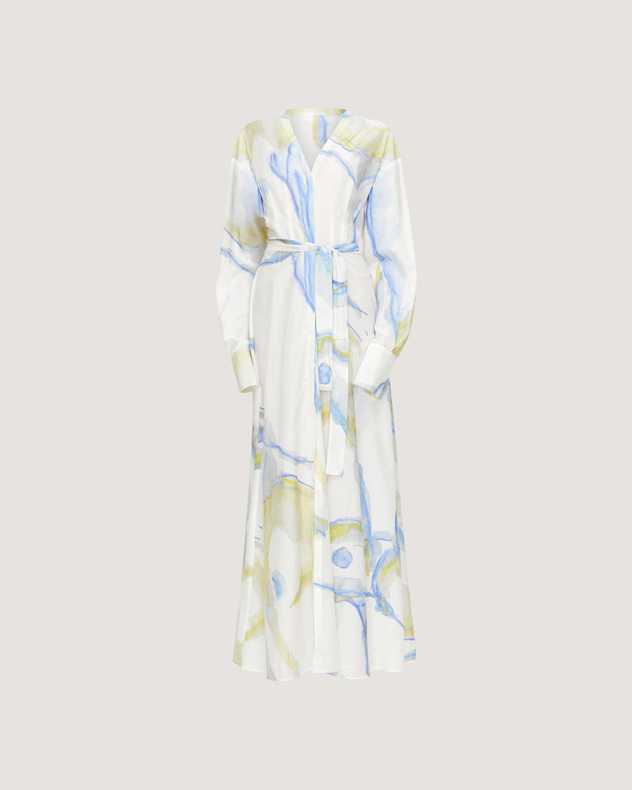 The Anouk Shift Dress is a lightweight shirtdress crafted from a luxurious 70% cotton, 30% silk blend. Designed with a button-through front, pleated waist detailing, and a removable belt for versatile styling. Showcasing an exclusive print created in collaboration with Anouk Colantoni.