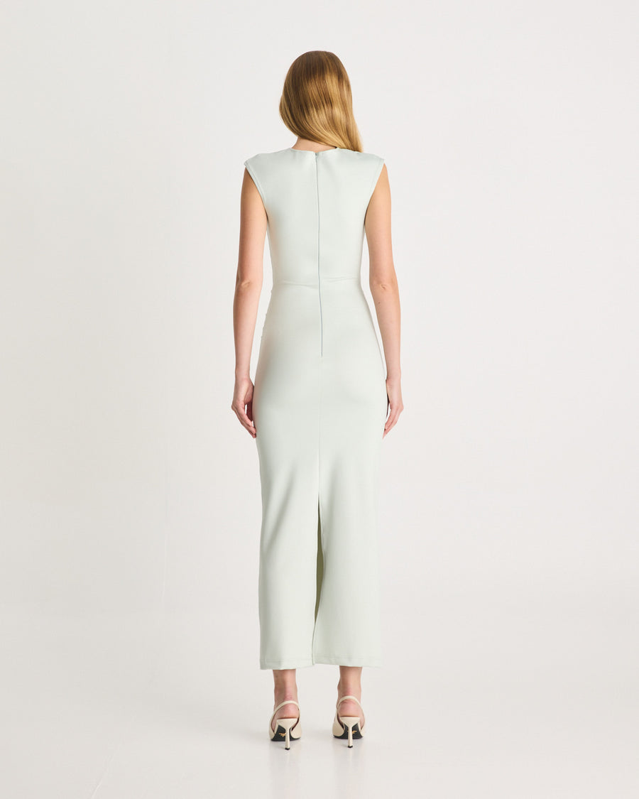 The Scuba Gathered Dress in Mint is a modern event silhouette, ready for your next occasion. It features a crew neckline, gathering through the body, a concealed zip, and a centre back split for ease of wear. Designed to be form-fitting, the Scuba Gathered Dress is crafted from our signature scuba. Shop online at Romy now with Afterpay and free express shipping available.