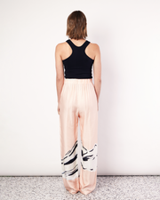 In collaboration with Tasmanian artist, Shelley Bickerstaff, we explore evocations and resonances of the female form in artwork exclusive to ROMY. Delicately placed on our signature style, the Hip Hills Pant features an elasticated waist and side pockets for an elevated yet comfortable style. By Romy, now available. 