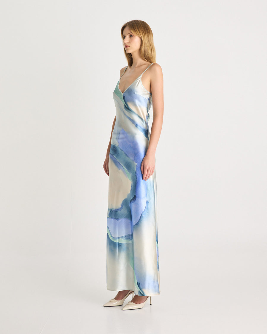 Crafted in a soft-satin fabrication, and in our exclusive print by Loralee Jade, the LJ Satin Maxi Dress is a classic style featuring a V neck, floor length hem and adjustable straps. Now available to shop at www.romythebrand.com