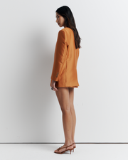 The Gemini Blazer offers a menswear-inspired, oversized silhouette with a three-button closure and jetted pockets, combining classic style with modern ease. Shop now for a versatile addition to your wardrobe!