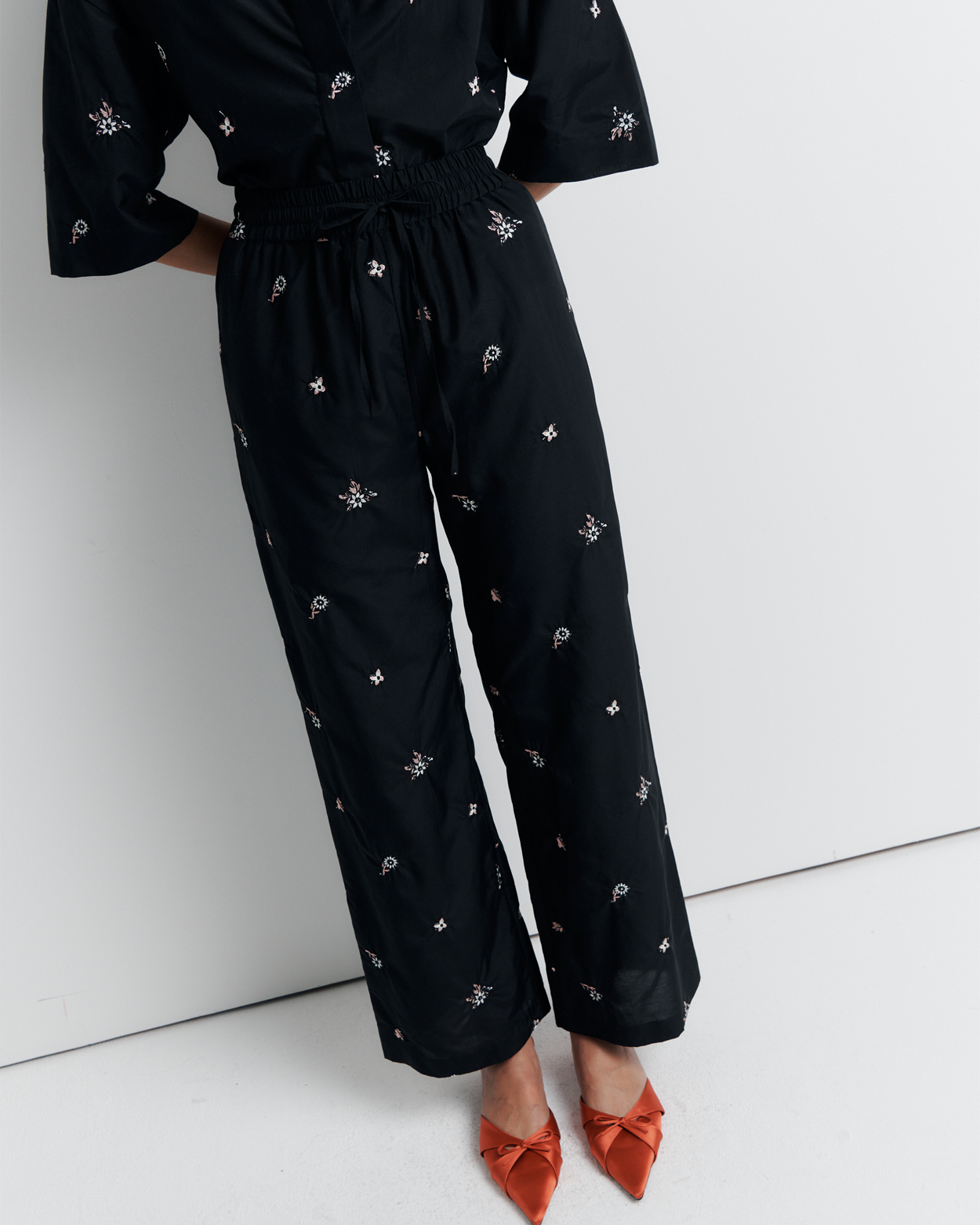 The June Pant is a relaxed elastic waist style featuring side pockets, a functional drawcord, and delicate floral embroidery for a subtle romantic touch. Style it with your favourite top for effortless everyday wear. Shop now.