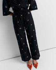 The June Pant is a relaxed elastic waist style featuring side pockets, a functional drawcord, and delicate floral embroidery for a subtle romantic touch. Style it with your favourite top for effortless everyday wear. Shop now.