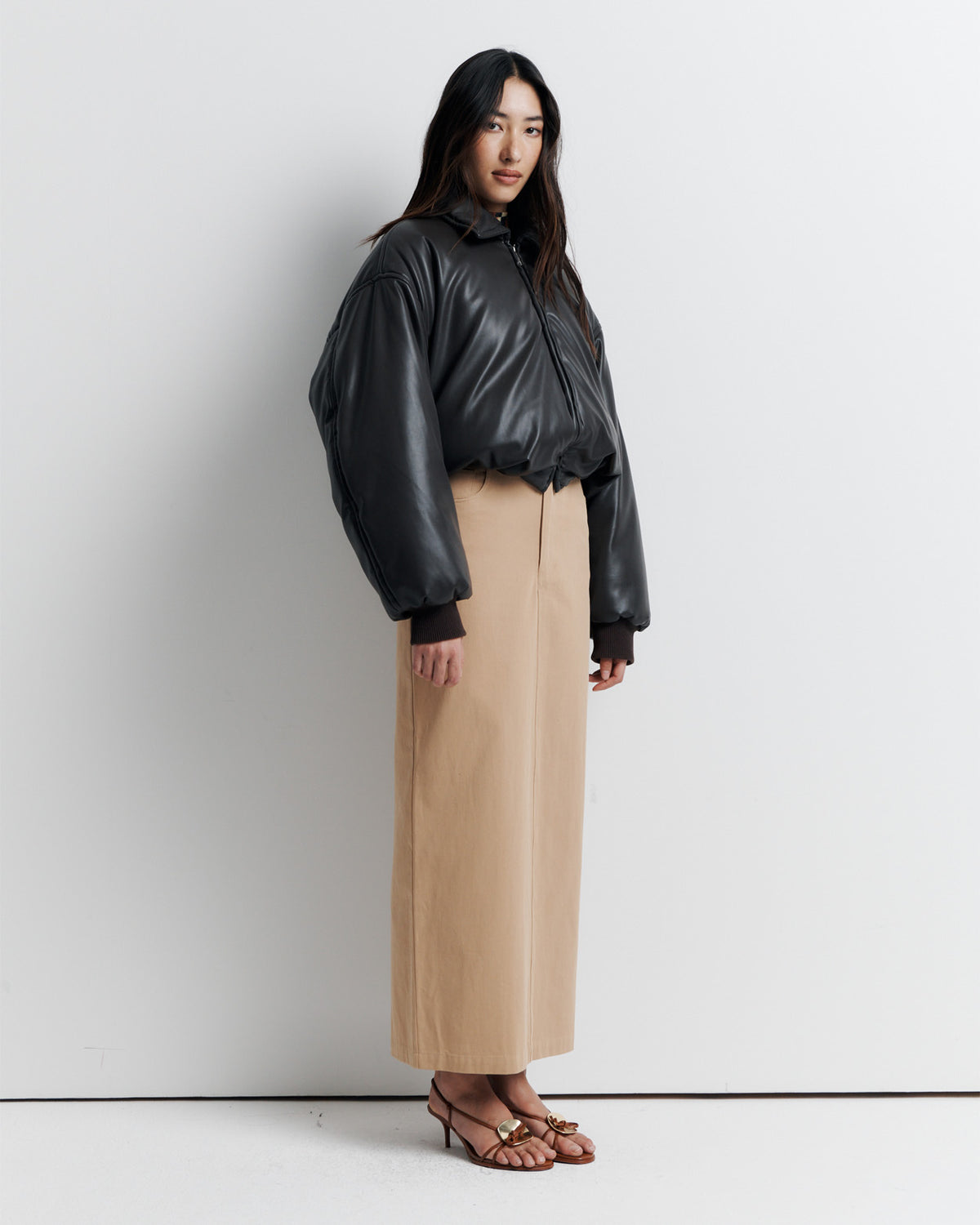 Padded Bomber Jacket in Brown, faux leather, side view.