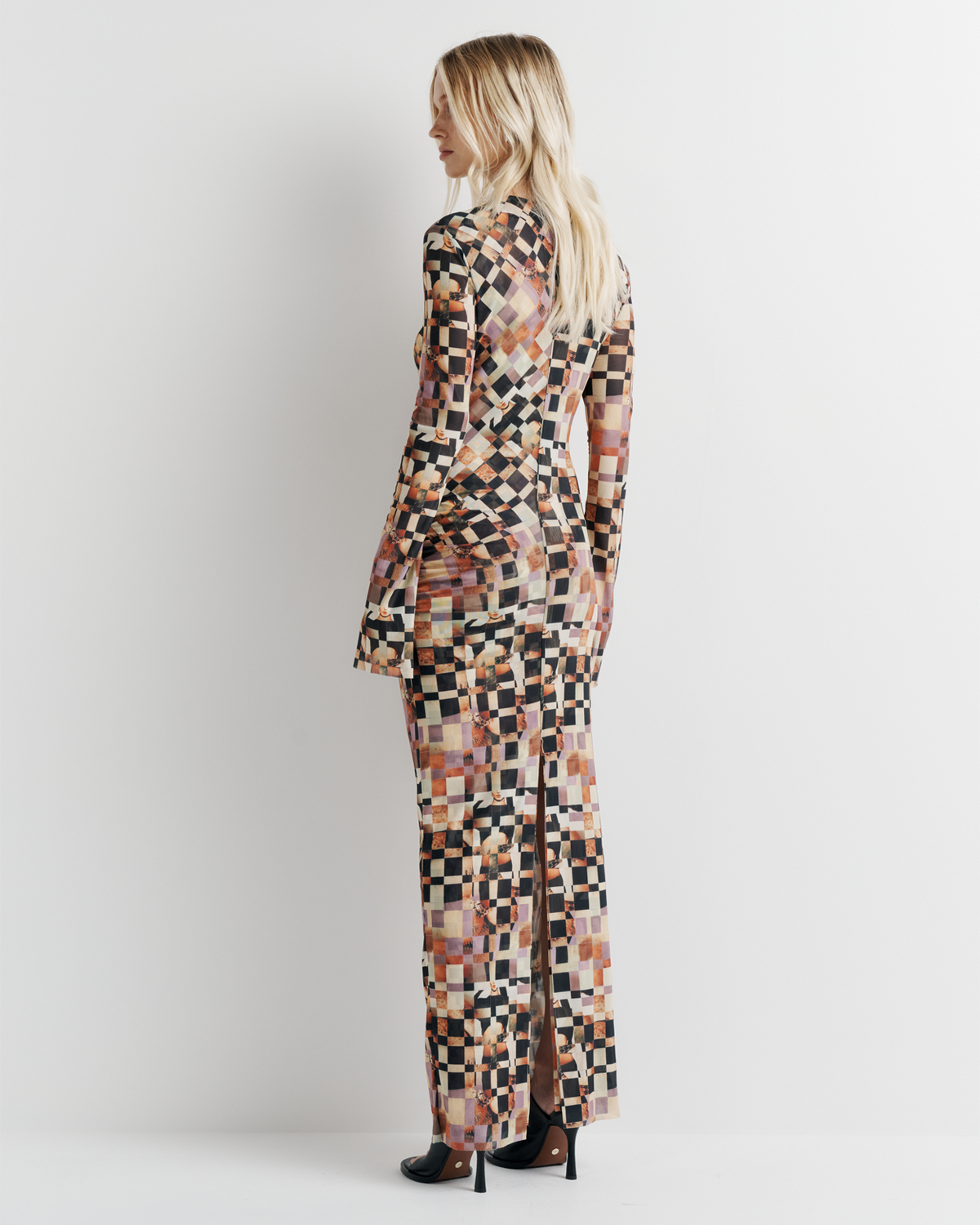 Clara Mesh Dress in collage print, side view on model.