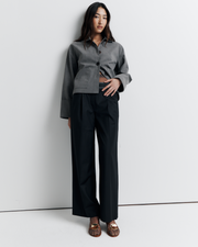 The Gabbi Jacket is a relaxed-fit outerwear piece crafted from soft vegan suede with a contrast pink twill lining. Designed with patch pockets, turn-back cuffs, and a four-button closure for effortless everyday style.