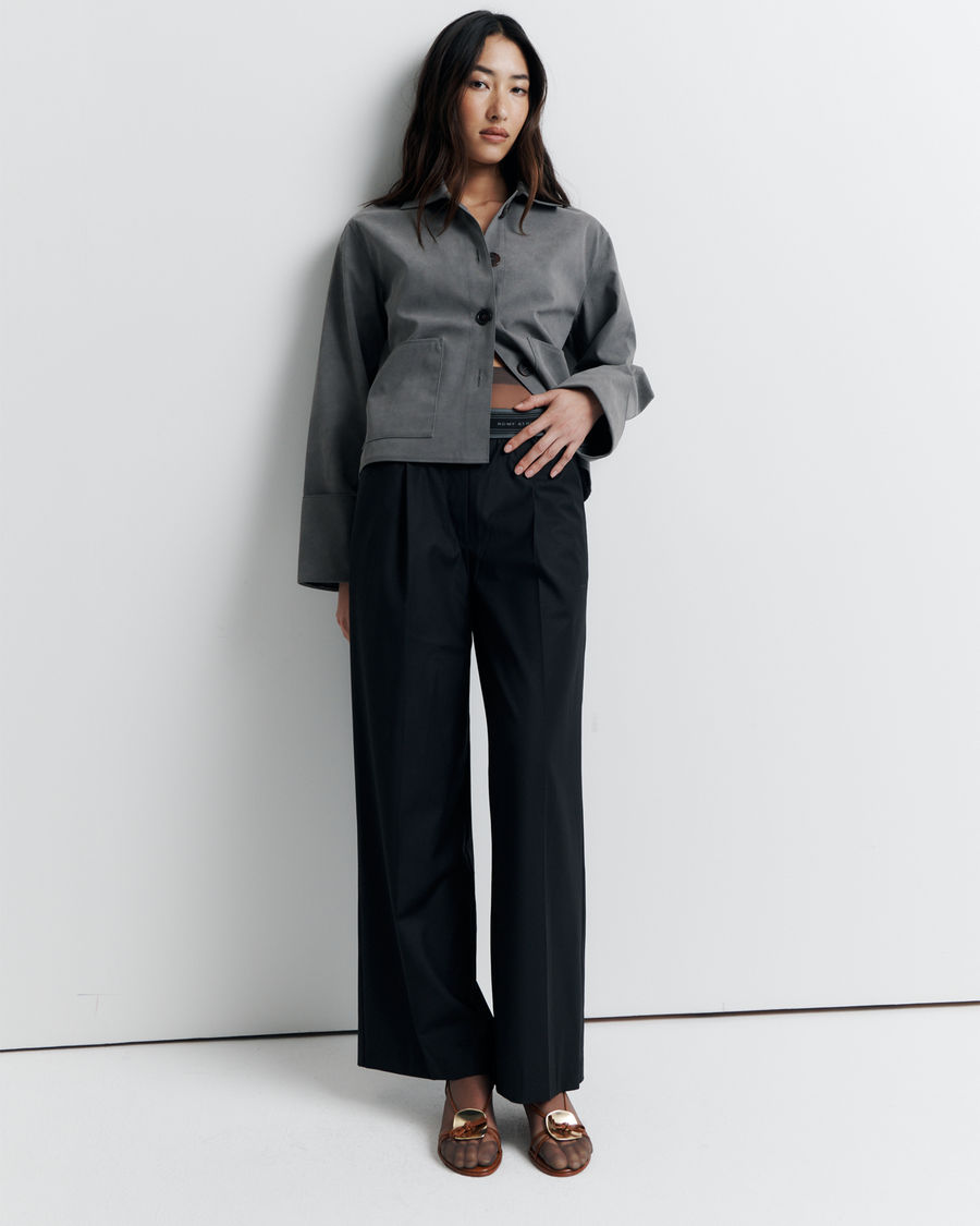 The Gabbi Jacket is a relaxed-fit outerwear piece crafted from soft vegan suede with a contrast pink twill lining. Designed with patch pockets, turn-back cuffs, and a four-button closure for effortless everyday style.