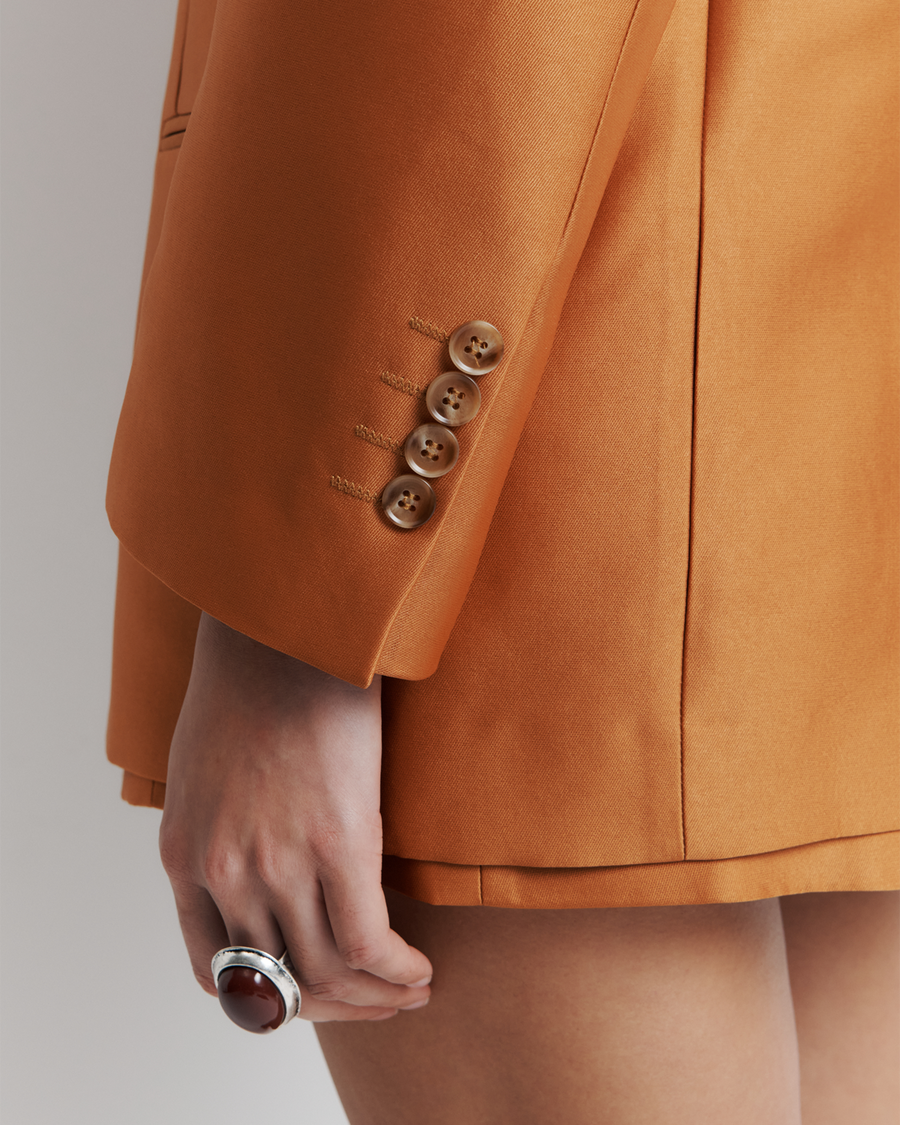 The Gemini Blazer offers a menswear-inspired, oversized silhouette with a three-button closure and jetted pockets, combining classic style with modern ease. Shop now for a versatile addition to your wardrobe!