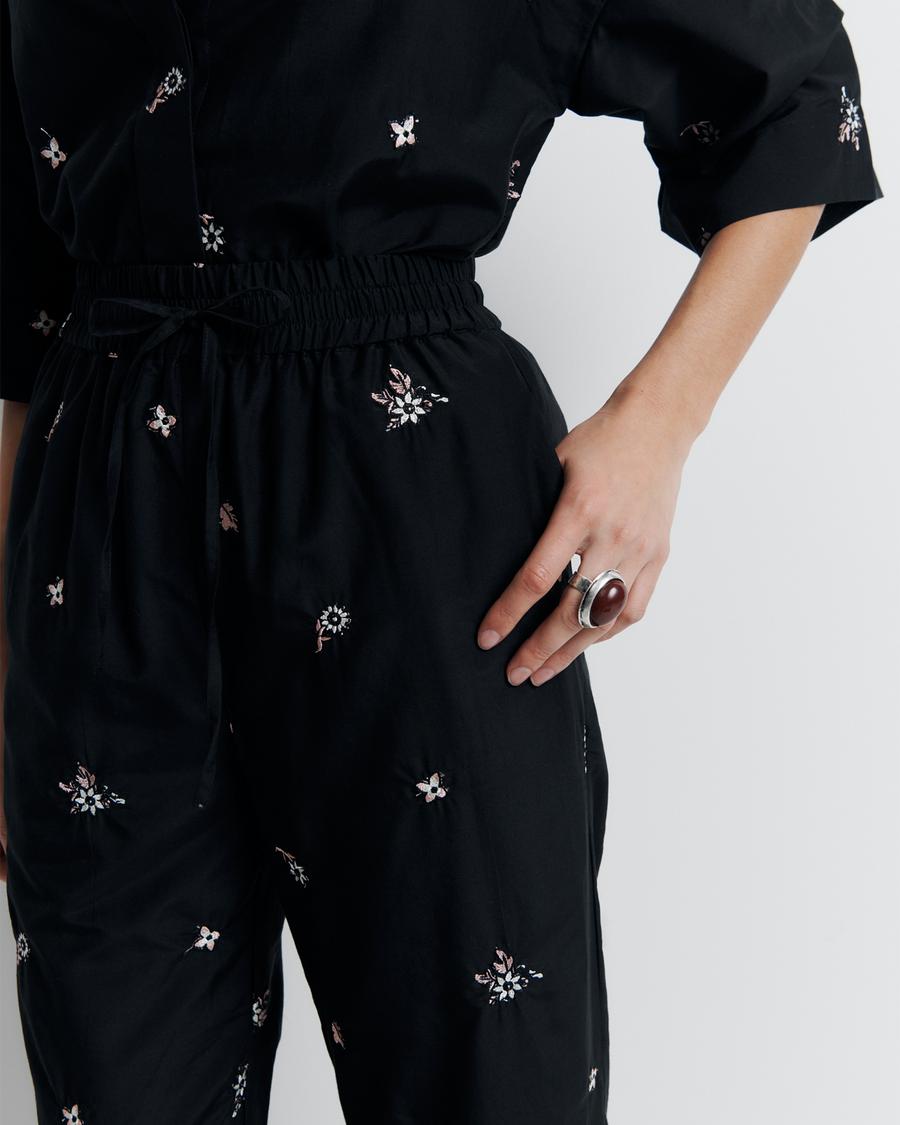 The June Pant is a relaxed elastic waist style featuring side pockets, a functional drawcord, and delicate floral embroidery for a subtle romantic touch. Style it with your favourite top for effortless everyday wear. Shop now.