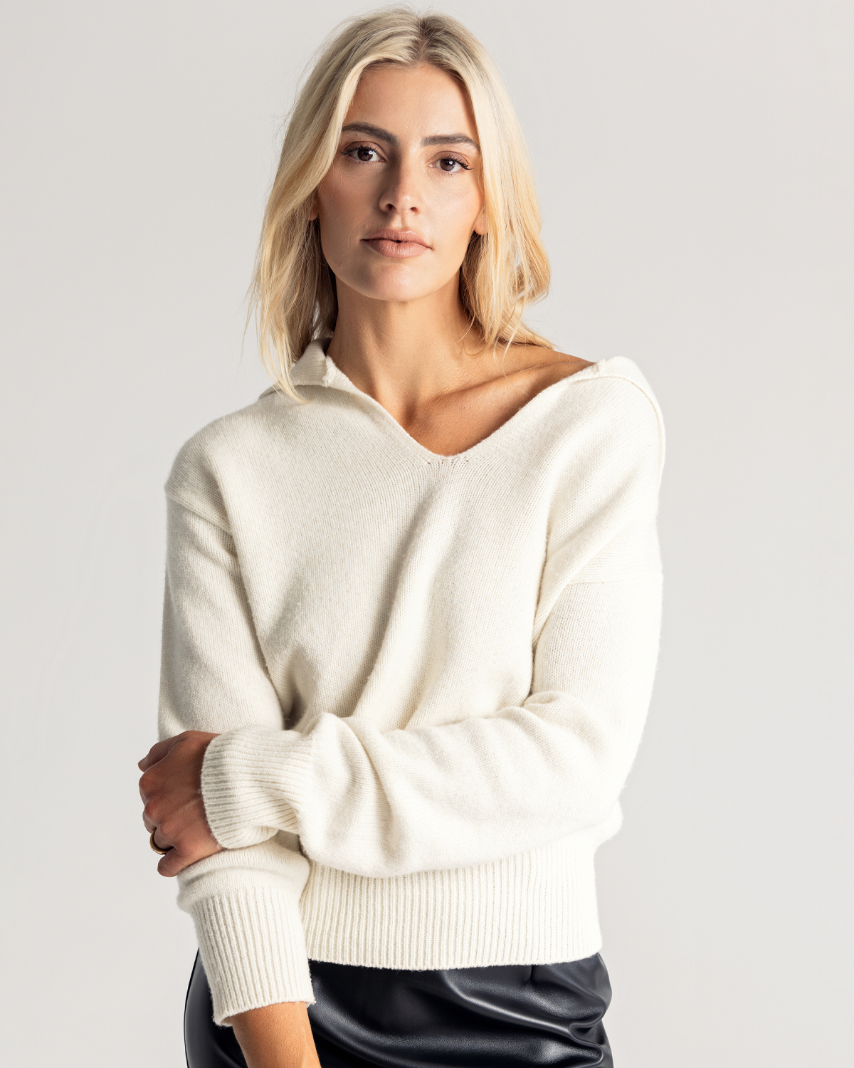 The Relaxed Collared Sweater is a luxurious testament to both warmth and style, expertly crafted from a sumptuous wool and cashmere blend. Designed for a relaxed fit, its oversized silhouette drapes effortlessly, embracing comfort without compromising on chic sophistication. Now available at Romy. 