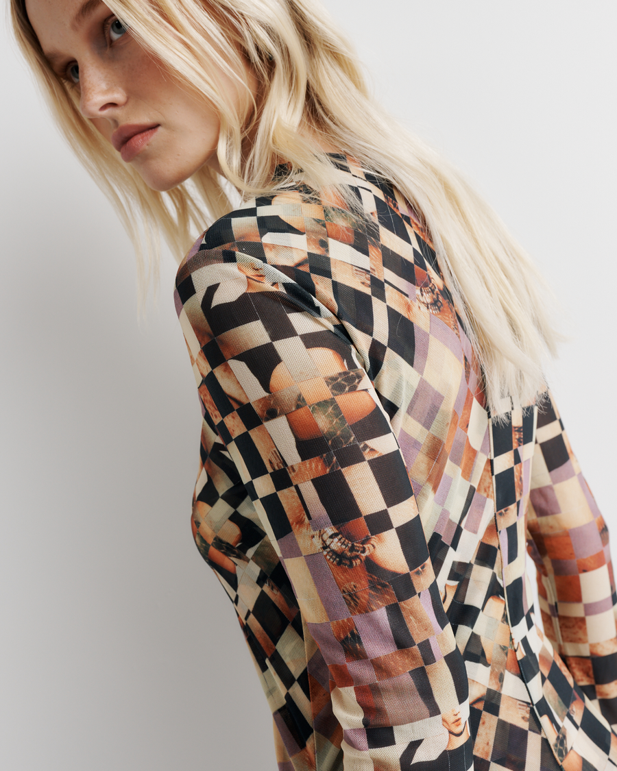 The Clara Mesh Dress – A Romy staple updated with side gathering, back split, and bell sleeves. Double-layered for a sculpted fit. Artwork by Phoebe Wills.