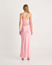 This stunning pink silk dress is designed to make a statement. Featuring intricate floral lace cut-out details that accentuate the waist, this dress is cut on the bias to softly skim the body, creating a flattering and feminine silhouette. Available exclusively at Romy and Coco and Lola. Shop online at Romy now with Afterpay and free express shipping available.