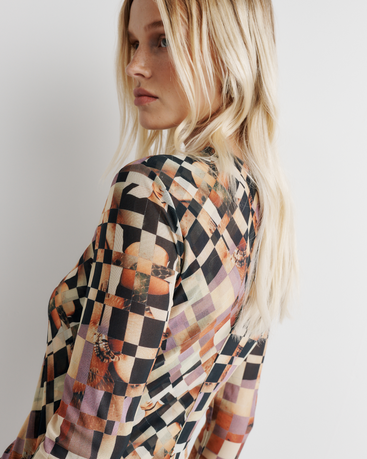 Clara Mesh Dress in collage print, front close-up on model.