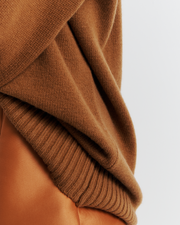 Ingrid Sweater: A relaxed V-neck knit crafted from a soft wool-cashmere blend. Features a slouchy fit with dropped shoulders and chunky ribbing for effortless, everyday comfort. Shop the look now.