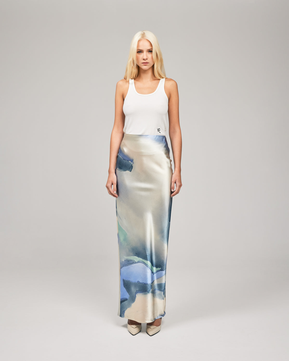 Crafted in a soft-satin fabrication, and in our exclusive print by Loralee Jade, the LJ Satin Maxi Skirt combines classical draping with a soft, pastell print. This floor length silhouette features an elastic waistband, concealed centre-back zip closure and a low waist. Now available at romythebrand.com