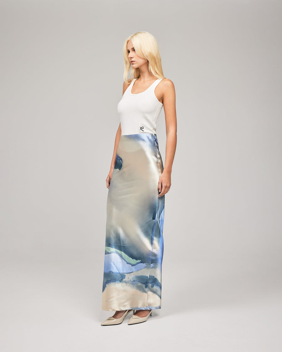 Crafted in a soft-satin fabrication, and in our exclusive print by Loralee Jade, the LJ Satin Maxi Skirt combines classical draping with a soft, pastell print. This floor length silhouette features an elastic waistband, concealed centre-back zip closure and a low waist. Now available at romythebrand.com