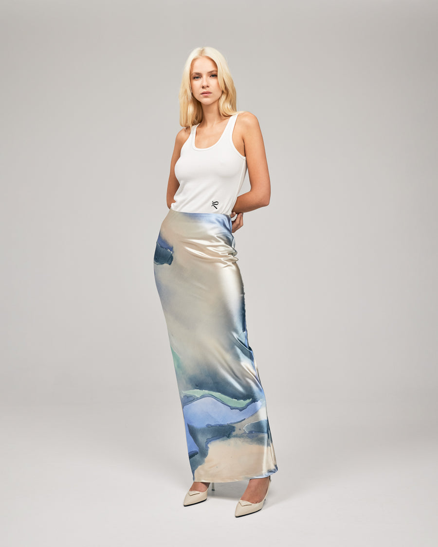 Crafted in a soft-satin fabrication, and in our exclusive print by Loralee Jade, the LJ Satin Maxi Skirt combines classical draping with a soft, pastell print. This floor length silhouette features an elastic waistband, concealed centre-back zip closure and a low waist. Now available at romythebrand.com