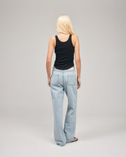 Straight-leg jean in white denim with cropped length and frayed hem