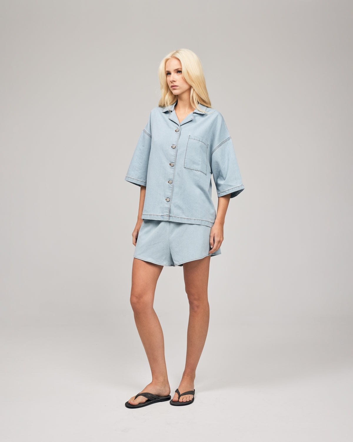 The Summer Shorts are a relaxed, comfortable, stylist fit perfect for warmer days ahead. Featuring an elasticated waist and side pockets, these shorts are crafted from light cotton in a stylish chambray blue wash. Shop online at Romy now with Afterpay and free express shipping available.