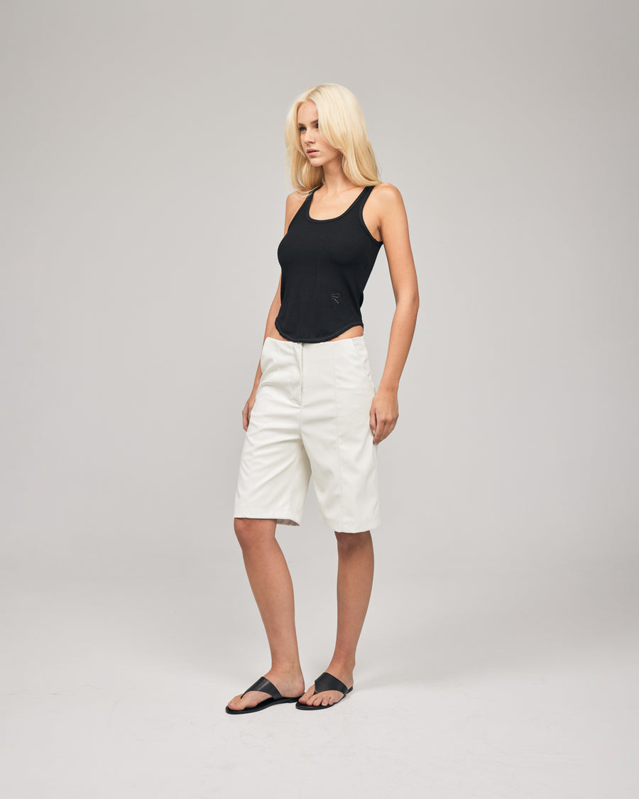 A tailored short cut in vegan leather featuring pin-tuck stitching through the front and relaxed fit, designed to be worn low waisted. Shop online at Romy now with Afterpay and free express shipping available.