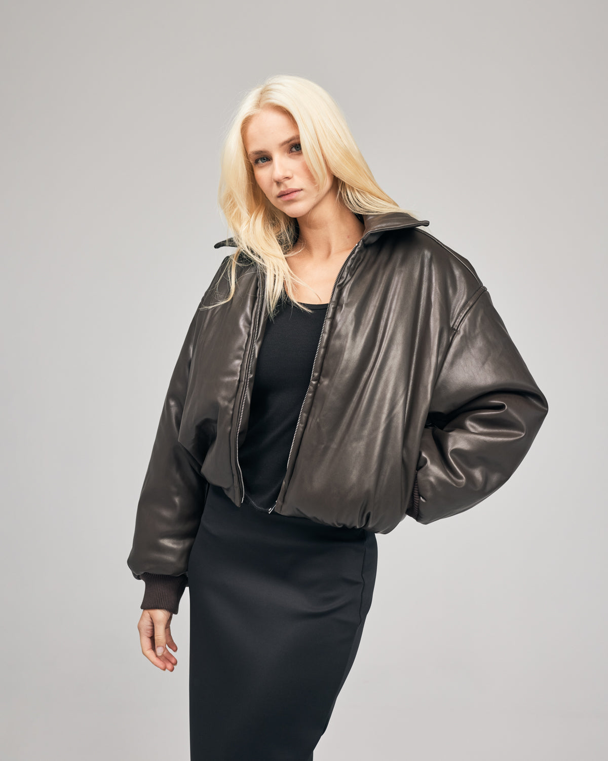 Add volume to your winter wardrobe with our Padded Bomber Jacket, made from a buttery soft faux leather in a Chocolate Brown colour way. Shop online at Romy now with Afterpay and free express shipping available.