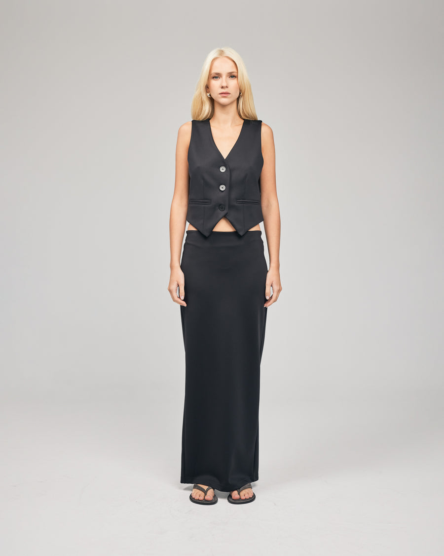 This Scuba Maxi Skirt is made from a soft and flexible stretch scuba and features an elasticated waistband and straight design complete with a single, elongating seam at the reverse so you can move with ease. Shop now. 