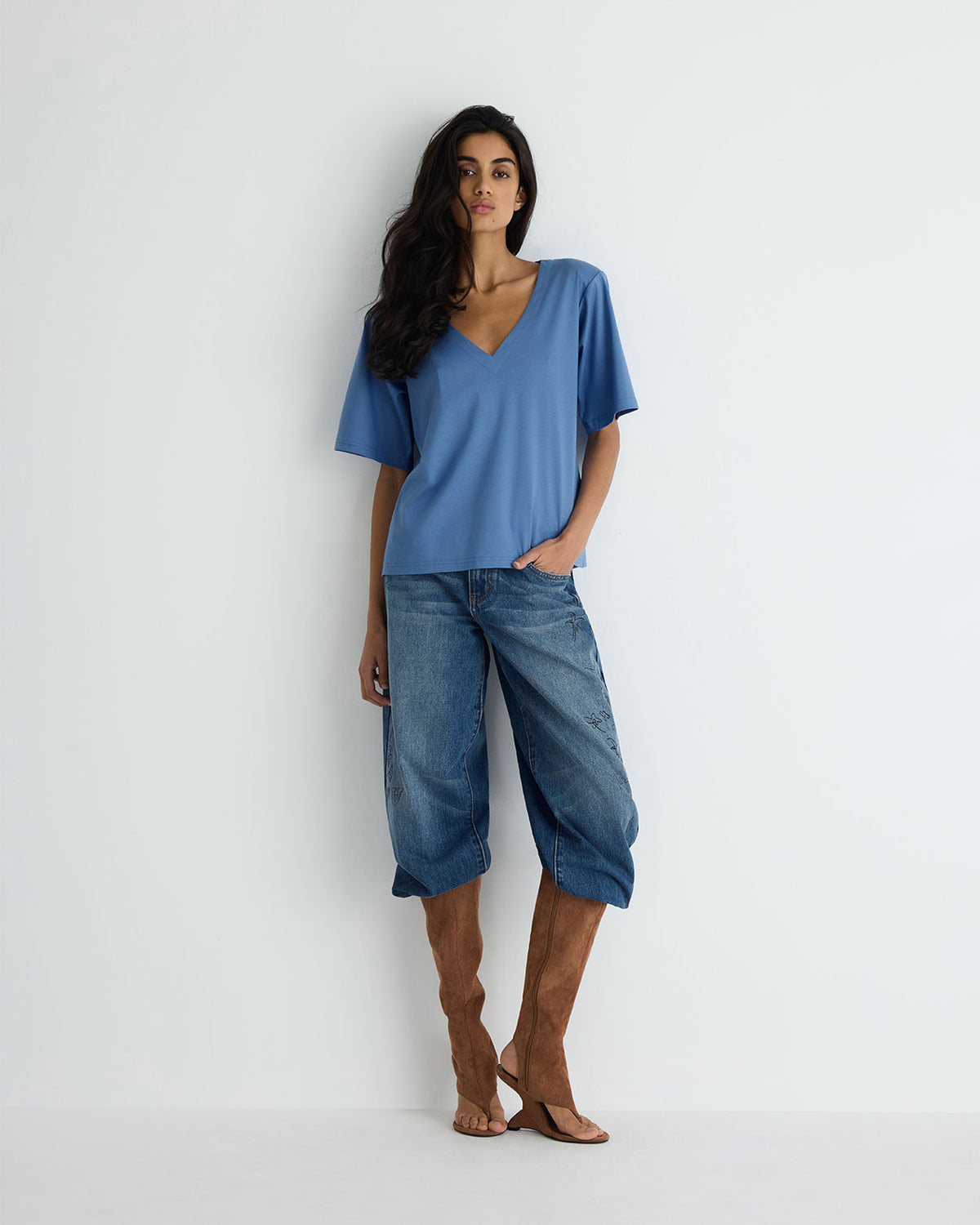 Clove Tee in blue, front view on model.