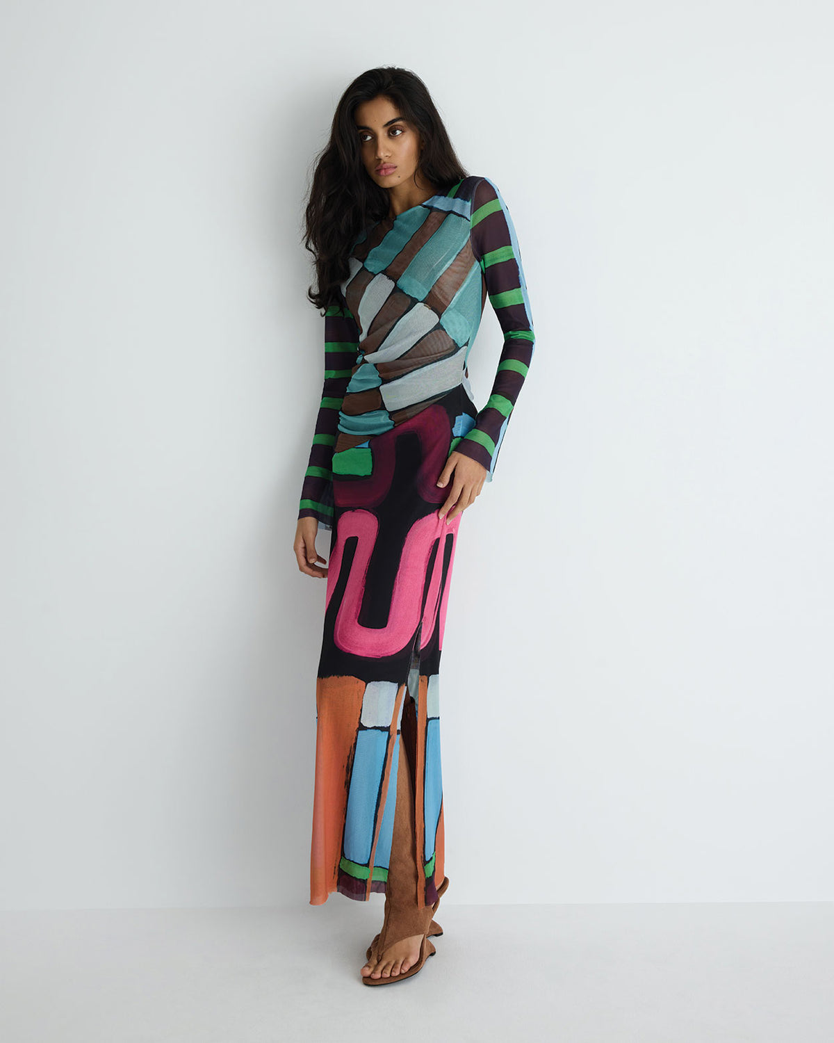 Portia Dress in multicolour print polyester mesh, back view on model.