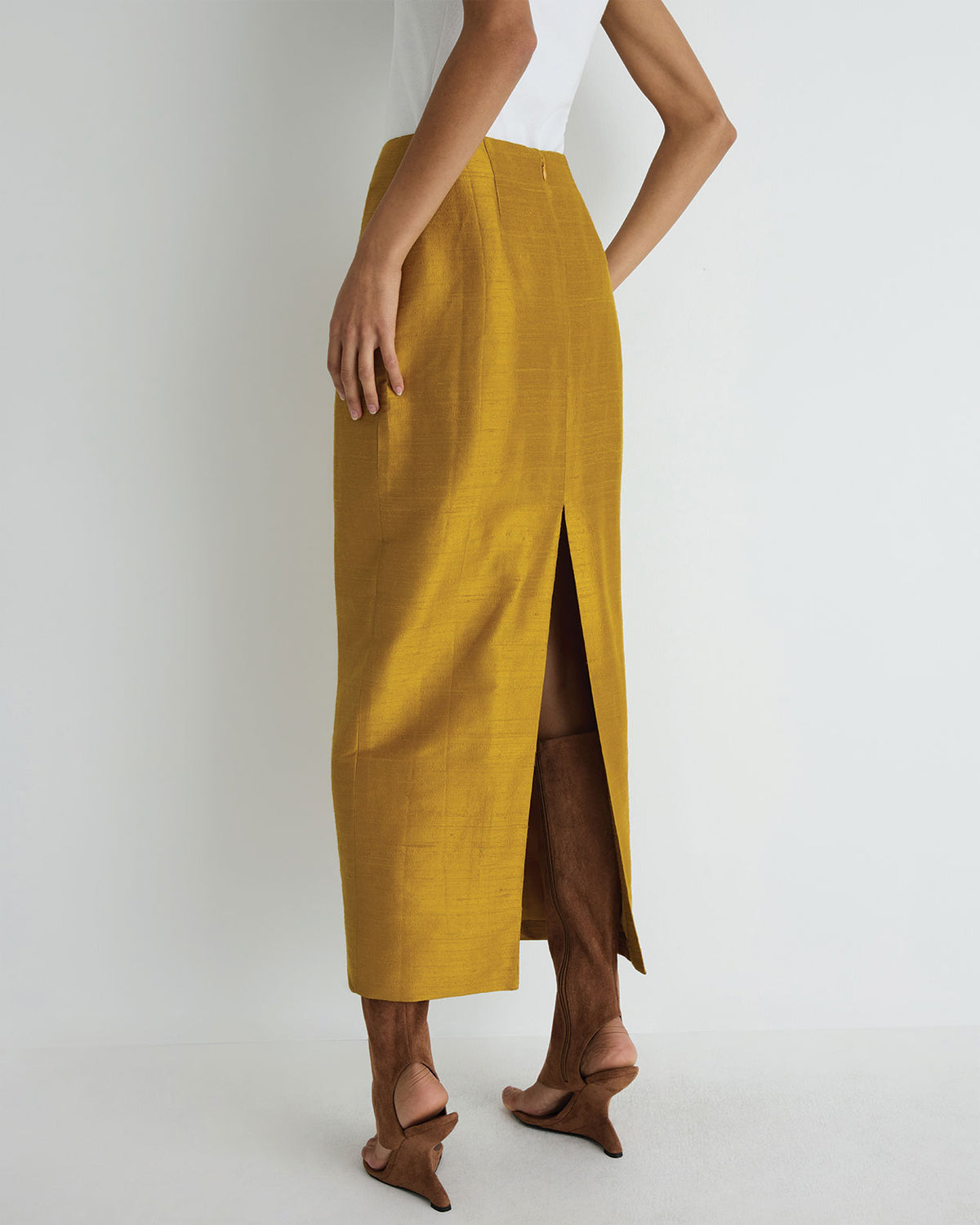 Veda Silk Skirt in gold, back close up view.