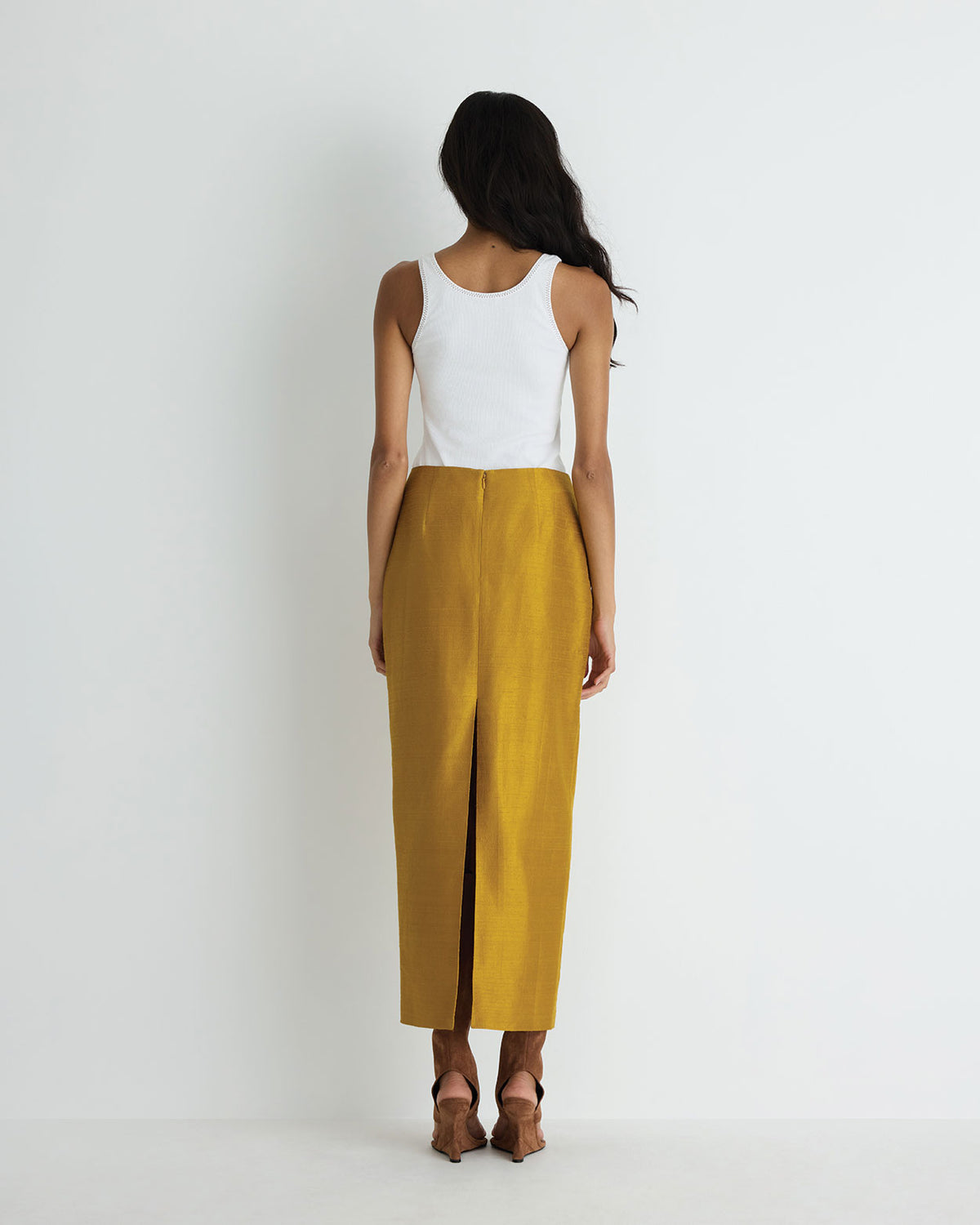 Veda Silk Skirt in gold, back view.