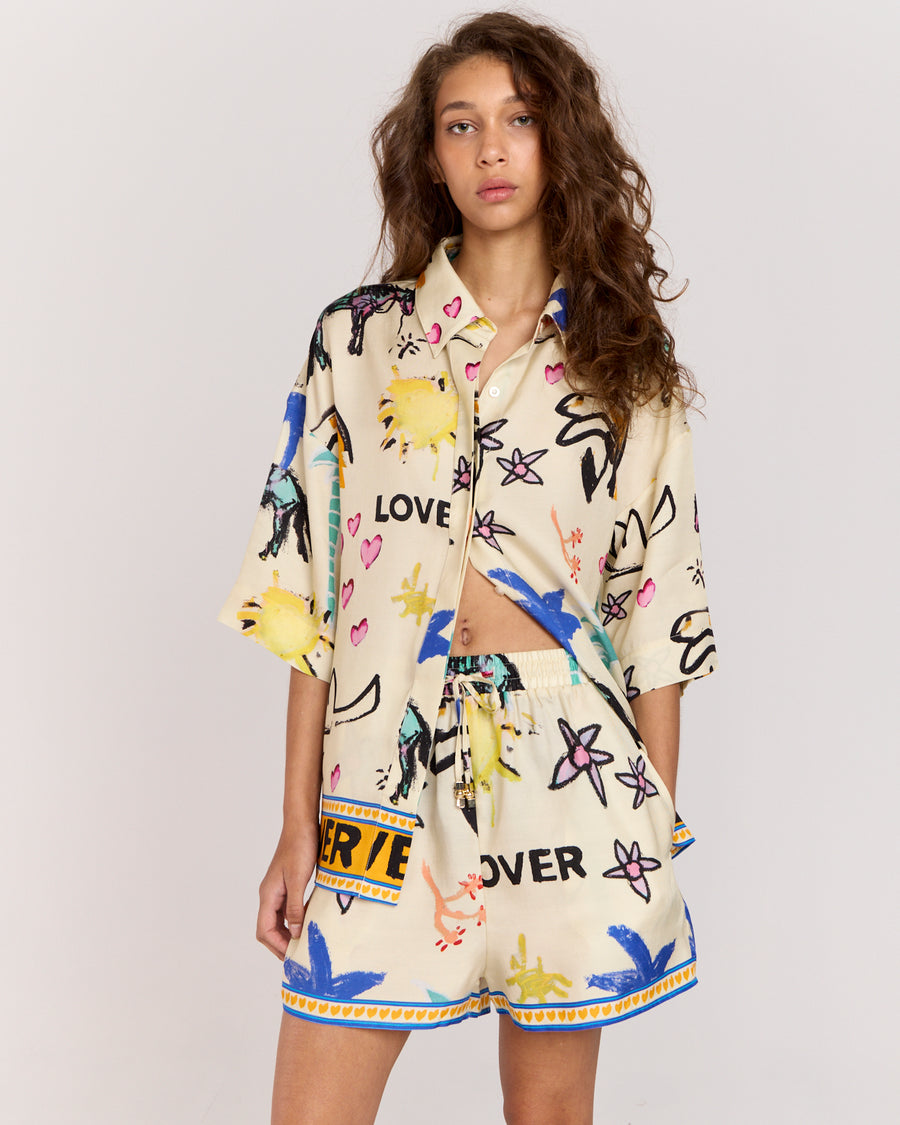 Experience effortless style with the Lover Shirt, featuring Jake Pedro's exclusive Lover Print. Crafted from a matte twill blend of viscose and recycled rayon, it drapes beautifully on the body with an oversized silhouette, relaxed shoulders, and a concealed placket for a sleek finish.